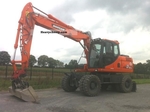 DOOSAN DX 235 COMPACT backhoe rental €160