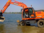 DOOSAN 16t Diéval backhoe rental €200