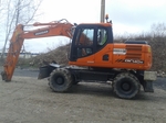 DOOSAN 140 backhoe rental €200